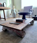 Yung’s coffee table, made from various antique elements, sits in his living room.