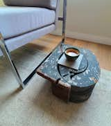 This side table is an architectural detail from renowned architect Julia Morgan’s former home. Yung cleverly repurposed it into a side table.