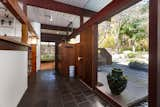 The slate entryway gives way to hardwood flooring in the living spaces.