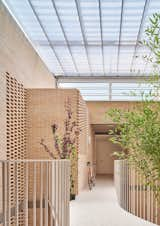 Peris + Toral Arquitectes, the same Barcelona firm behind the 2024 RIBA International Prize–winning Modulus Matrix, designed Borrassá, a mixed-used building with 54 social housing units, in the city’s Besòs district. The brick lattice walls help ventilate the atrium.