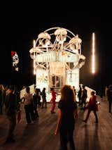 Jean-Michel Basquiat’s painted Ferris wheel features music from Miles Davis and references to Jim Crow-era segregation. Basquiat only agreed to participate in the fair once Heller acquired permission to use Davis’s music.