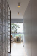 Hallway in the bathroom of an apartment in the prototypical urban residential apartment building the Immeuble Clarté in 1932, a now UNESCO World Heritage site in Geneva, Switzerland commissioned by Edmond Wanner and designed by Le Corbusier and his cousin Pierre Jeanneret with shower enclosed by glass blocks.
