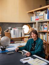 Maria sits at her desk, surrounded by ephemera from her editorial and academic career. She has filled the apartment with Riva’s lighting and paintings, in addition to papers and artwork related to her publishing career, which allowed the photographers to capture accumulated layers of her life. "Our two practices are quite similar," says Paleari. "We like to leave hints inside a picture, some things that perhaps the reader can see only in a second look, and so every time suggests a new understanding of the space."