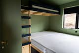 The second bedroom features built-in bunk beds.