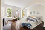 The third-floor bedrooms each feature wood-burning fireplaces.