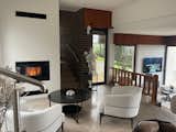 A Monolithic ’70s Home Lands on the Market in Burgundy for $779K - Photo 6 of 9 - 