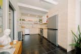 Both the bathroom and kitchen feature Zia Tile—the backsplash features the brand’s Pomelo cement tile.