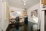 Anna and Jesús are artists, and they utilized one bedroom as a studio space.