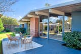 Eichler homes often forgo street-facing windows, opting instead for glazed rear facades.