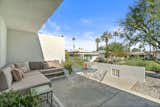 A partially covered patio provides a place to relax and entertain outdoors.