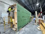 Workers assemble a modular home in a factory for Inherent Homes, a Chicago prefab home builder.