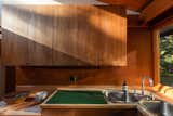 The kitchen is packed with original details, including the wood cabinets and countertops.