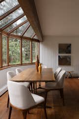 A semiglazed bump out brings daylight into the dining area.