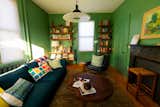 Upstairs, the duo built more custom furniture. The shelves were designed by Emily and the side table by Wu, who made both.