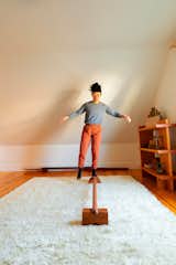 Wu’s brand—Work in Use—makes a variety of exercise tools, including a balance rail, hand weights, and gymnastics rings.