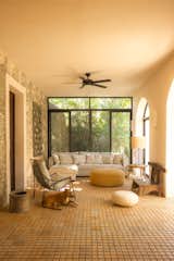 The living room includes an ottoman made of 11,000 feet of hand-spun thread from the sansevieria plant.