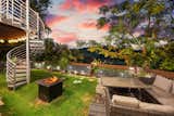 The home is set in the Apache Shores community, and amenities include a private boat launch on Lake Austin and a disc golf course.