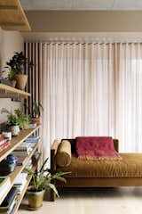 Across from the primary is a second bedroom that is used as a study. The daybed is by TRNK.