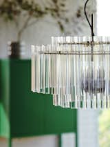 The glass pendant lamp comes in two different styles, one horizontal, the other more vertical.