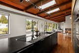 In Portland, a Dusty-Blue Midcentury With a Spruced-Up Interior Seeks $1.7M - Photo 4 of 13 - 