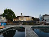 The redwood patio leads directly to a private boat dock.