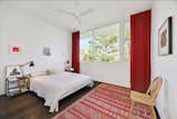 Both bedrooms are oriented towards natural landscape, not a city outline.