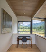 A small study area is located in the loft on the mezzanine level; it is both a destination within the house and a perch from which to enjoy the natural light and surrounding vistas.