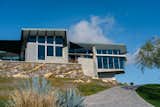 "My wife said to me, ‘Whatever you do, if you ever get to really build a house, don't build a spaceship," says Bata, whose wife Rose always preferred a California Craftsman over anything modern. Later adding strata to the side of the pool and the garage, Bata wanted "to make it look like the house got pushed out of the earth," he says. "So it became the spaceship it was never supposed to be."