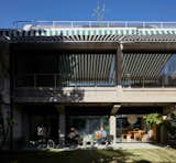 This Rooftop Greenhouse Is the Ideal Work-From-Home Space for a Plant-Loving Uruguayan Couple