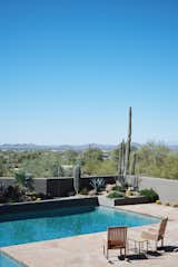 The pool area has been landscaped with native plants that extend the Sonoran Desert landscape. "I didn’t want to see concrete around the pool—I wanted to see a garden," says Michelle. "We tried to convert it back into the desert flora that is typical around here, and to make it beautiful and interesting."