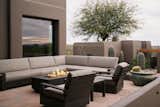 The outdoor spaces are just as important as the interior, with a large entertaining zone complete with a firepit.