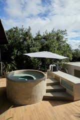 The terrace also has a concrete hot tub sits waiting for cooler weather.