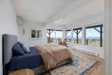 Three of the four bedrooms are located on the home’s middle level.