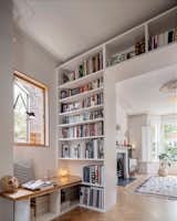 Designed for extra seating and to complement the small window, the built-in bench has become the family’s go-to spot. The Artemide mini Anglepoise lamp (£400) sheds light on nighttime reading. Other lampshades, bought while traveling (to places including Bangkok), serve as cherished mementos.