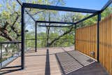 The second floor balcony offers views of Lady Bird lake and the Austin skyline.