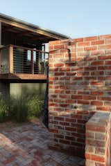The recycled bricks were also used to create an outdoor shower.