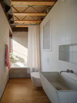 This $2M L.A. Compound Comes With a Classic Bungalow and a Brutalist ADU - Photo 7 of 13 - 