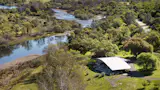 A Frank Lloyd Wright Protégé Built This $2M Home With a Massive Curved Roof - Photo 17 of 18 - 