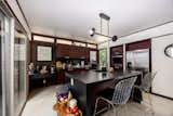 A 350-Year-Old Oak Lives at This $780K Usonian-Inspired Home in Florida - Photo 8 of 14 - 