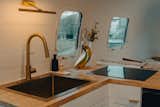 Sealed Acacia wood was used for the butcher block countertops.