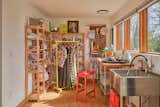 The primary suite’s dressing room is currently set up as a ceramics studio.