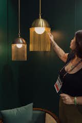 The pendant lamps are just as striking as the mirror.