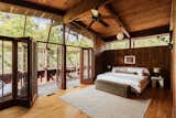 The primary bedroom opens to a private deck.