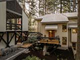 The home’s exterior features tongue-and-groove cedar siding and a metal roof.