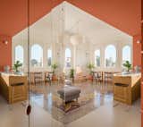 How They Pulled It Off: A Mirrored Wall That Lets the Sun In—and Hides a Home Office