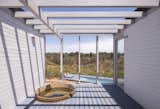 The traditional wooden hot tub in this interior patio is from El Tonel. Whitewashed pine slats line the walls.