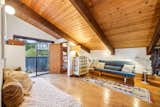 The lofted bedroom has a private, northwest-facing deck.