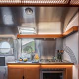 Wright designed a mobile trailer in 1939, the Dinky Diner, but it was never built. This trailer expands on some of its ideas.