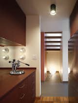 The custom kitchen is by Fenix.