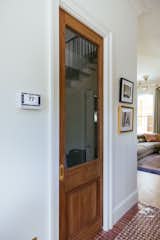 Insulating materials like this wooden pocket door help optimize the efficiency of the Trane heat pump.